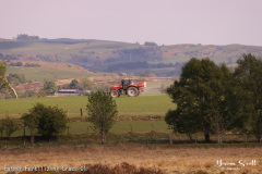 Farmer Fertilizing Grass